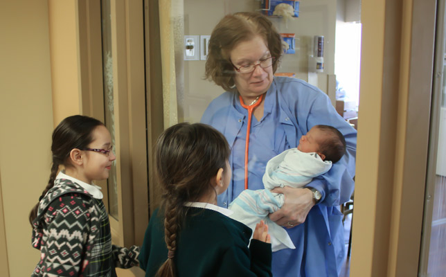 greeting-newborn-through-adoption-at-hospital