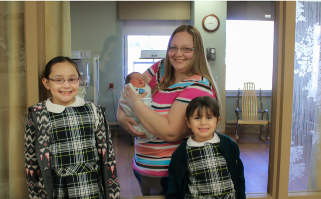 newborn-with-adoptive-family-at-hospital