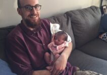 Uncle John holds Aria