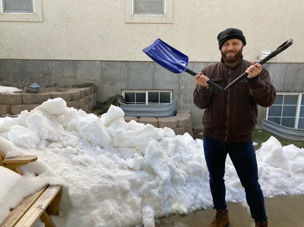 Chris broke the shovel in the snow and ice